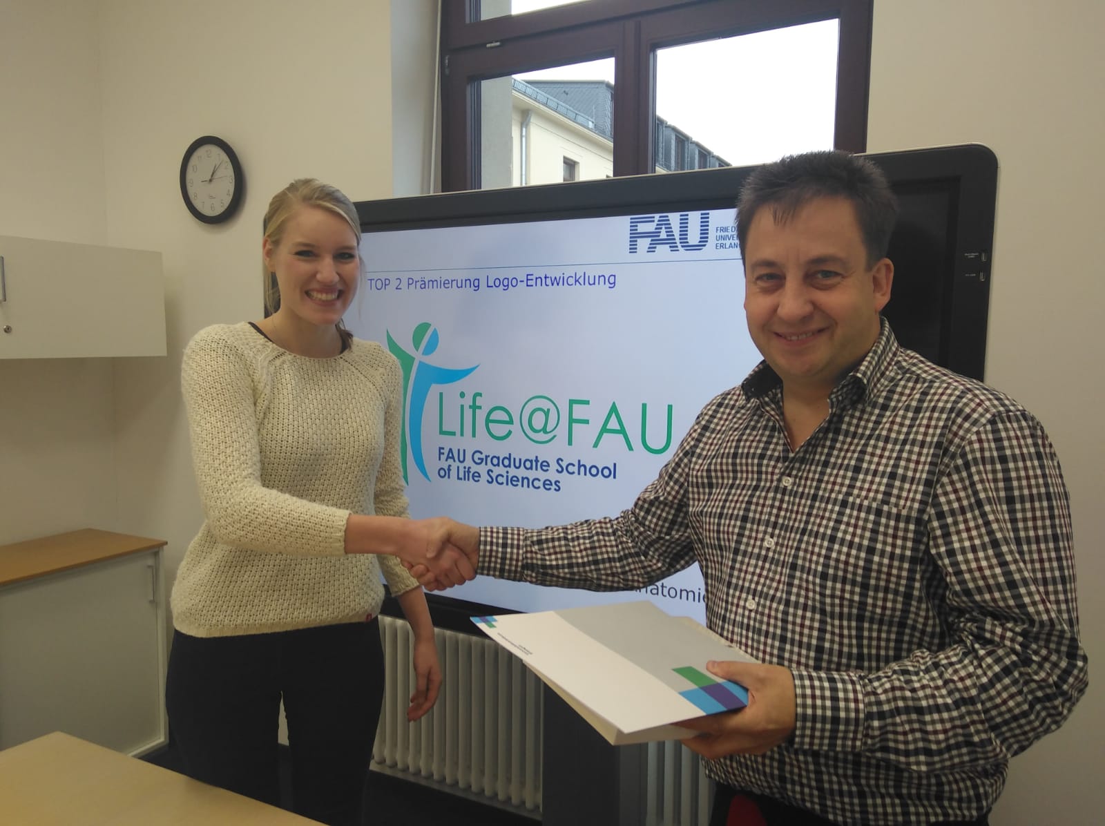 Towards entry "Logo for the Life@FAU – Hannah Mäurer as winner of the ideas competition"